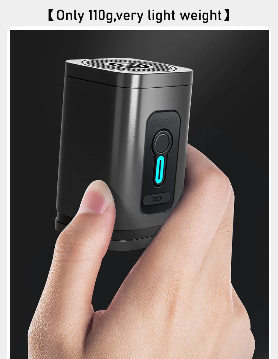 Ben Nevis Small electronic device held in a hand with a black background