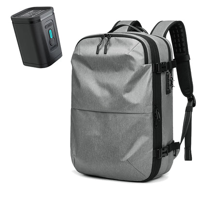 Gray backpack with black straps and a power bank on a white background